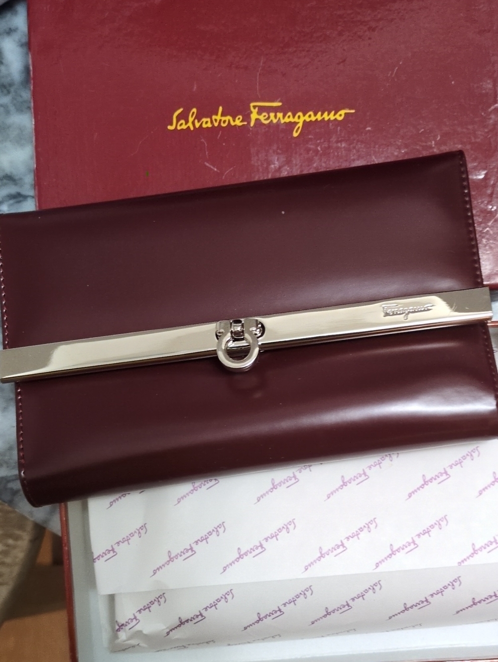 Salvatore Ferragamo Maroon Leather Clutch with Silver Bar Detail